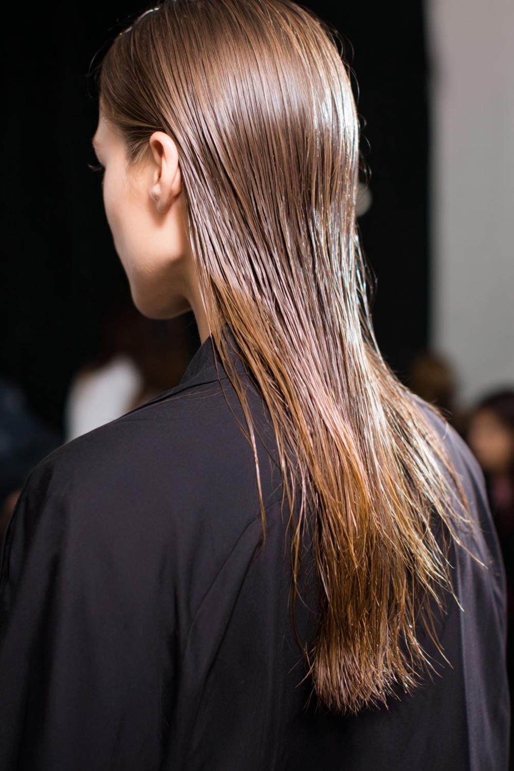 14. Fresh Hair Ideas 2026: Wet-Look Sleek Back with Textured Ends