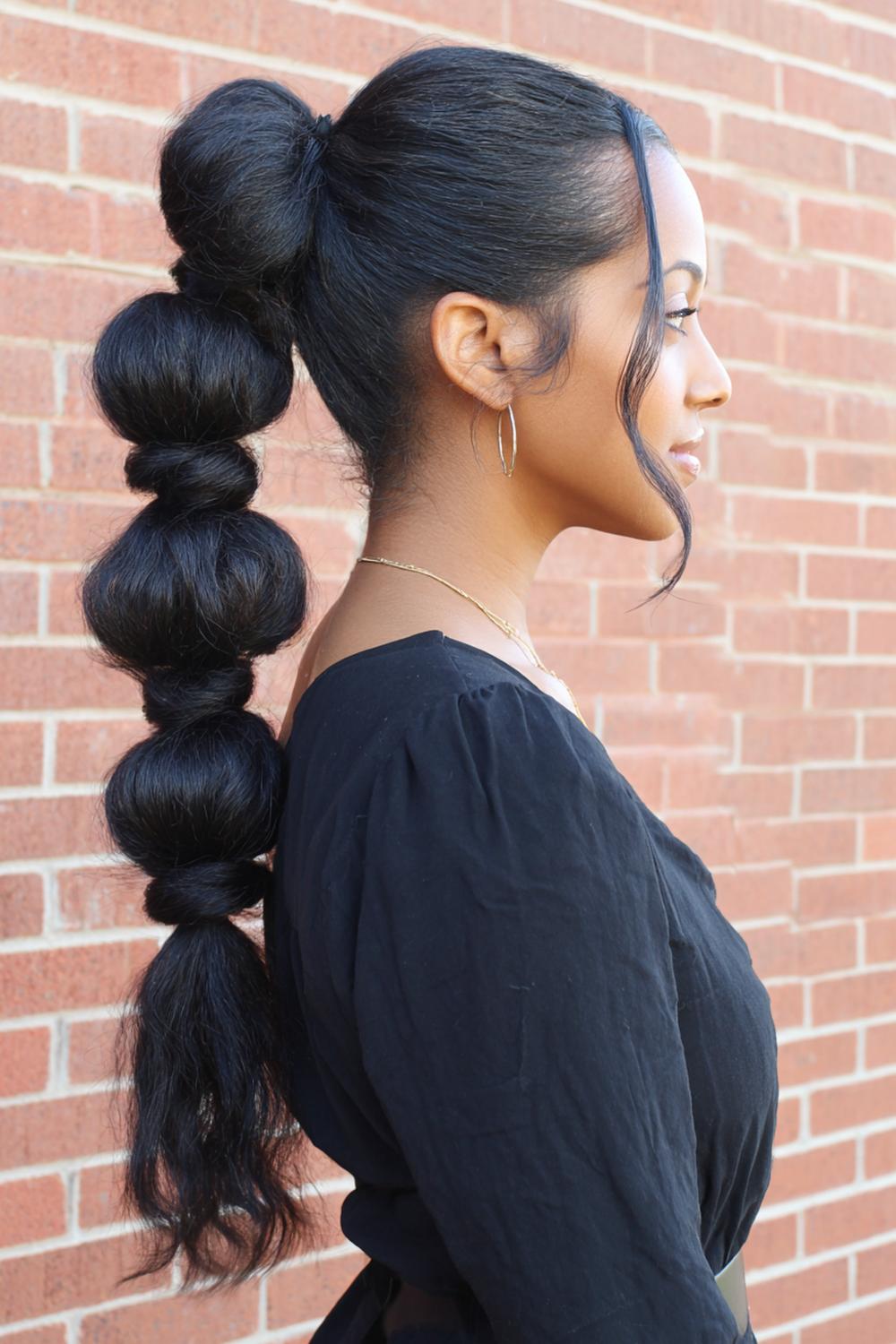 15. Fresh Hair Ideas 2026: Bubble Braid Ponytail with Minimal Elastic Spacing