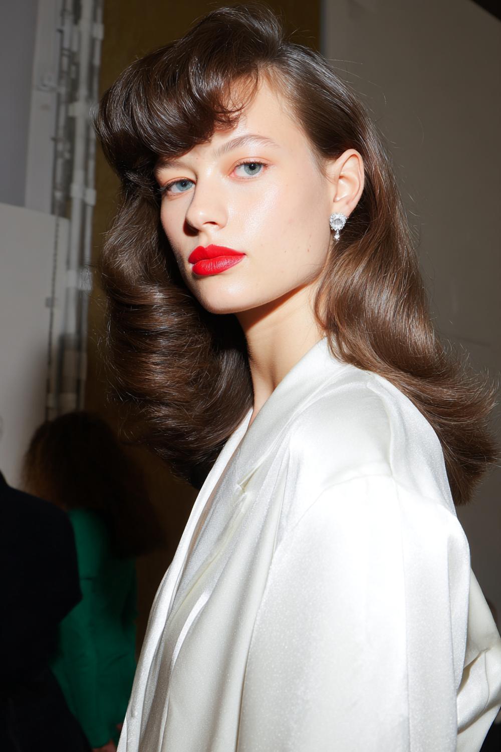 13. Modern Hair Looks 2026: Bouncy Blowout With Velcro-Roller Volume and Flipped Ends