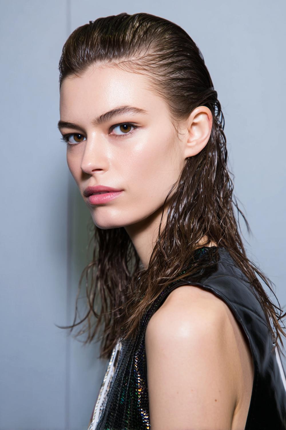 13. New Hairstyles 2026 Wet-Look Slick Back with Defined Ends