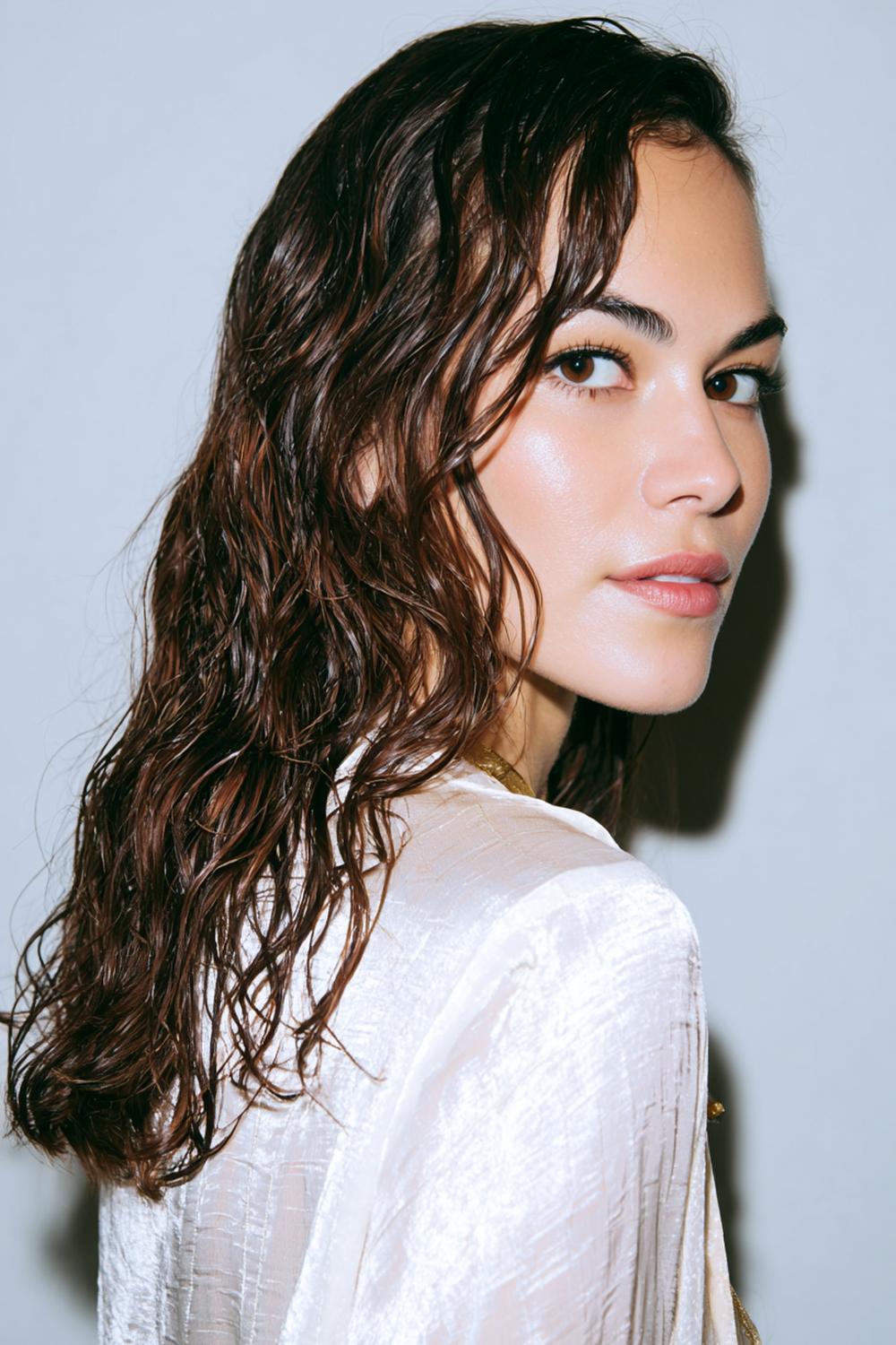12. Pinterest Hair Inspiration 2026: Wet-Look Waves with Deep Side Part and High Shine Gel Finish