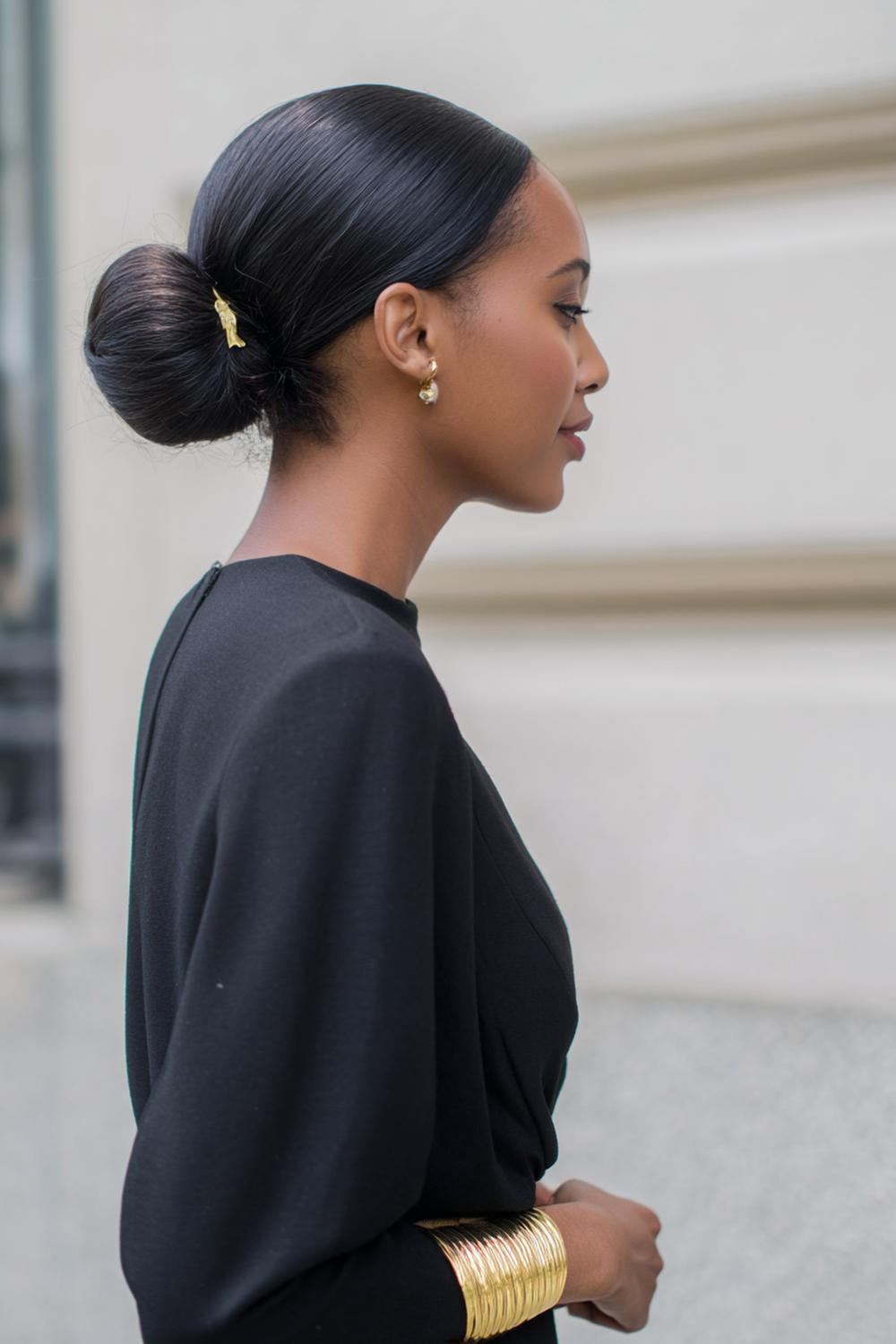 14. Pinterest Hair Inspiration 2026: Sleek Middle-Part Bun with Minimalist Gold Cuff Accent