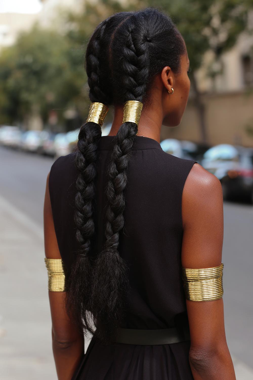 21. Pinterest Hair Inspiration 2026: Two-Strand Twist Braids with Clean Parts and Gold Cuffs