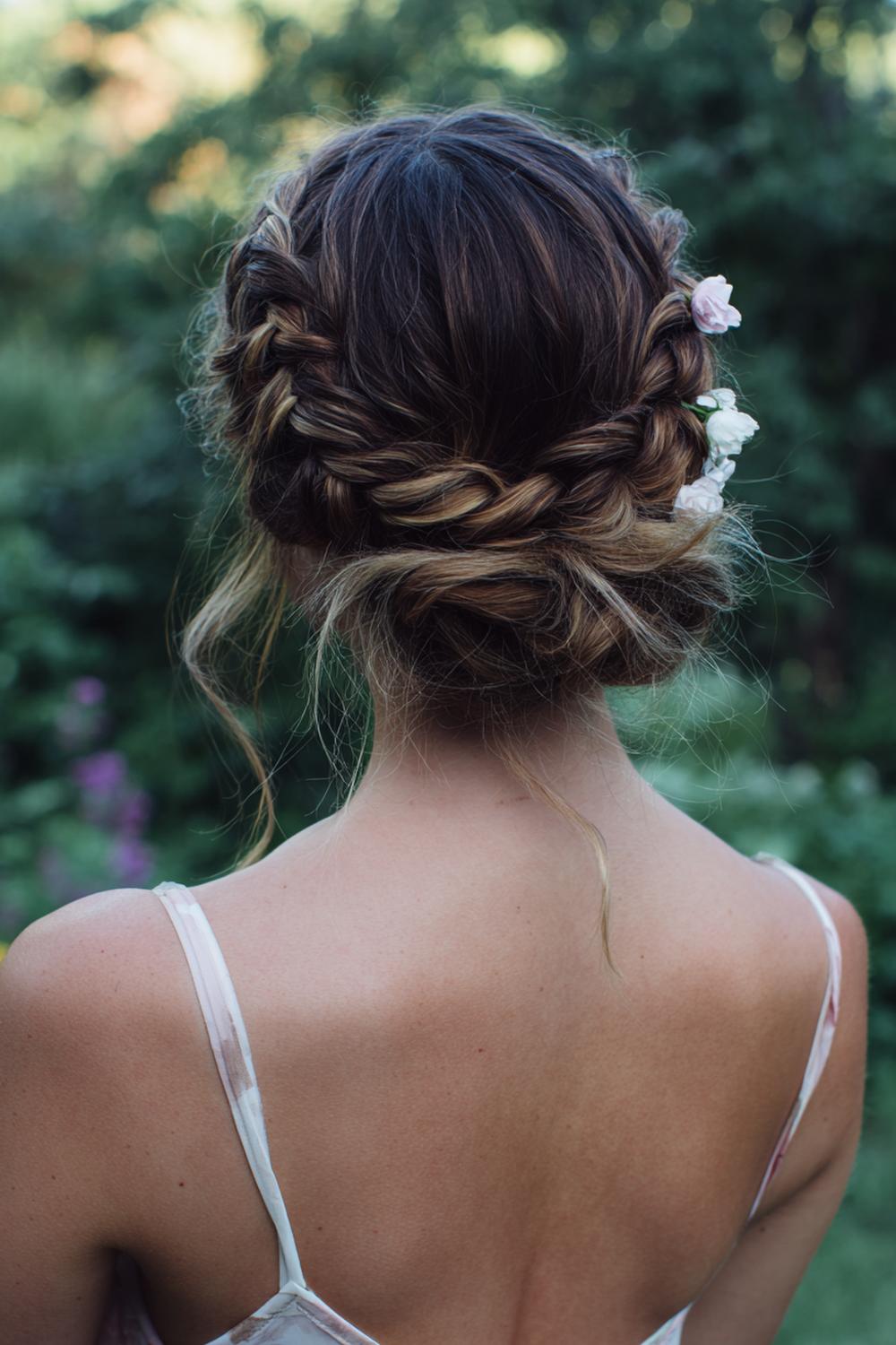 8. Pinterest Hair Inspiration 2026: Braided Crown Updo with Loose Tendrils and Garden Glow