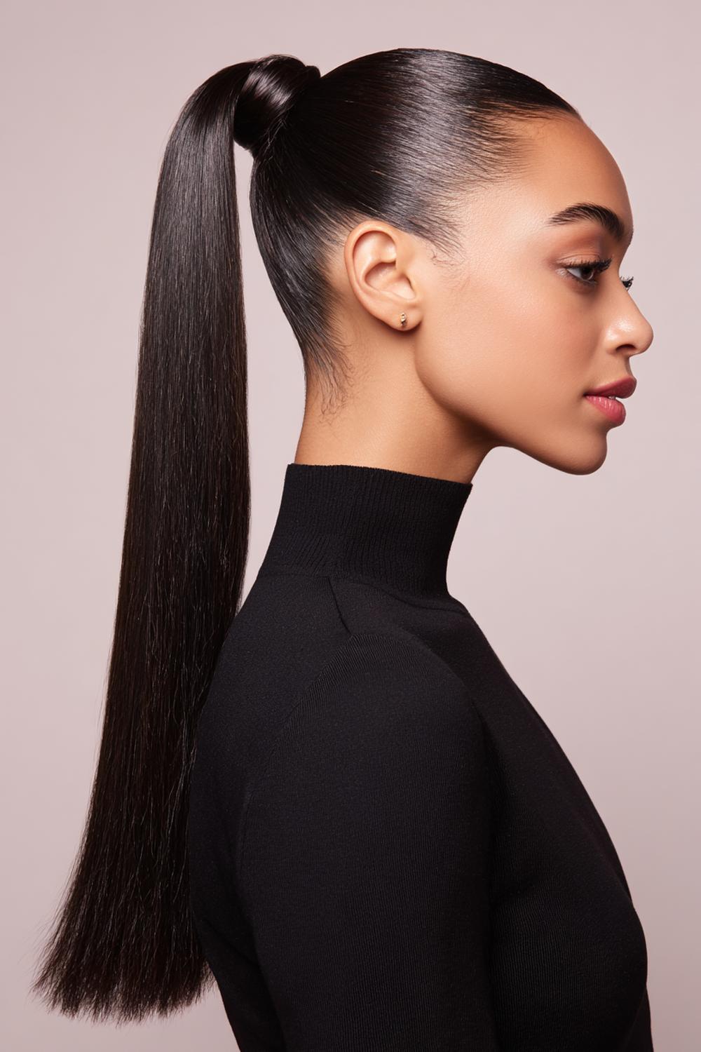 10. Popular Hairstyles 2026: Sleek High Ponytail With Wrapped Base and Gloss Finish