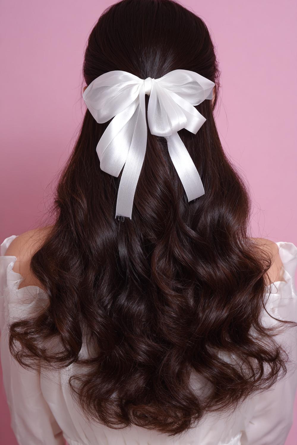 15. Popular Hairstyles 2026: Half-Up Bow Hairstyle With Ribbon Tie and Curled Ends