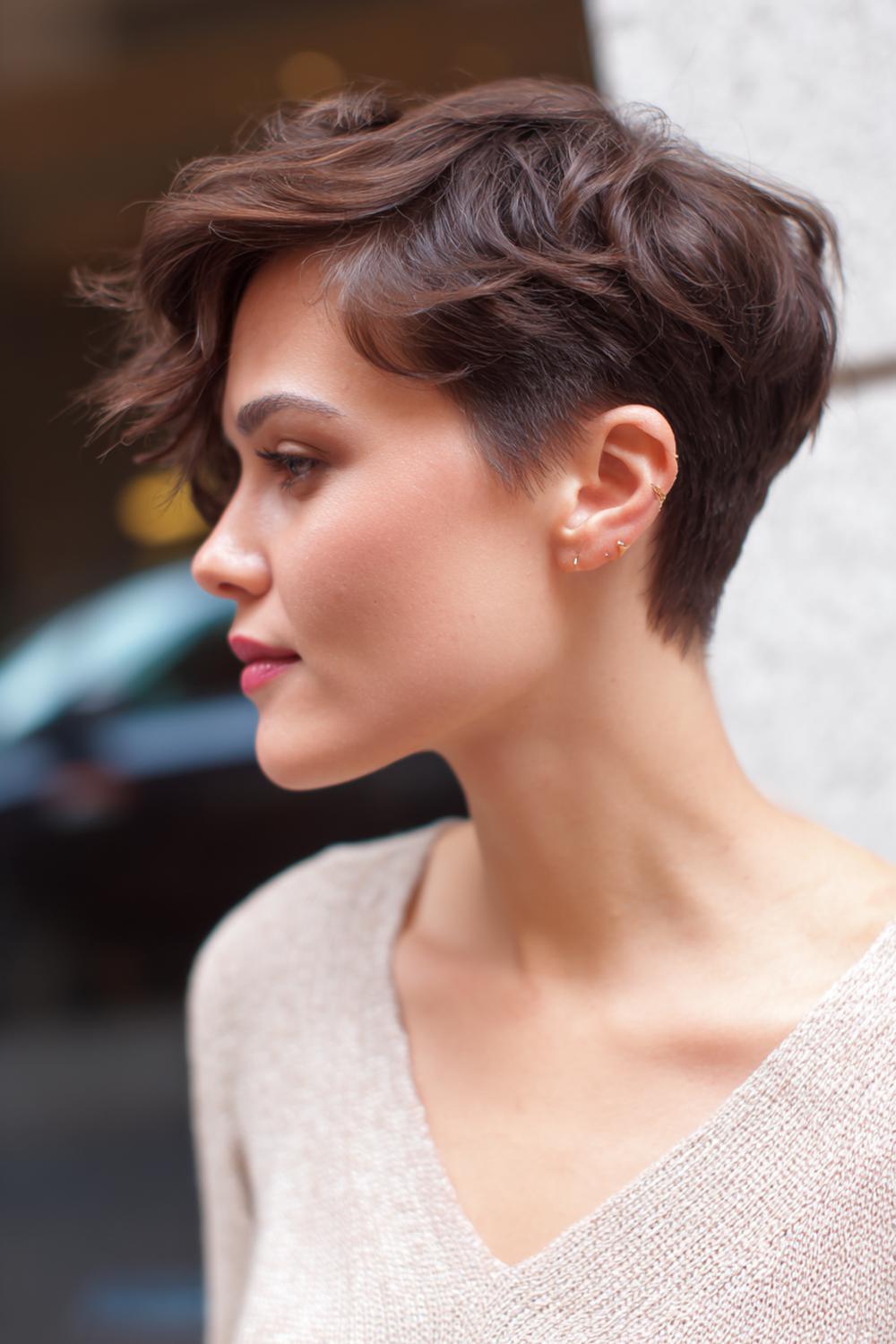 18. Popular Hairstyles 2026: Pixie Cut With Long Top Sweep and Textured Sideburn Detail
